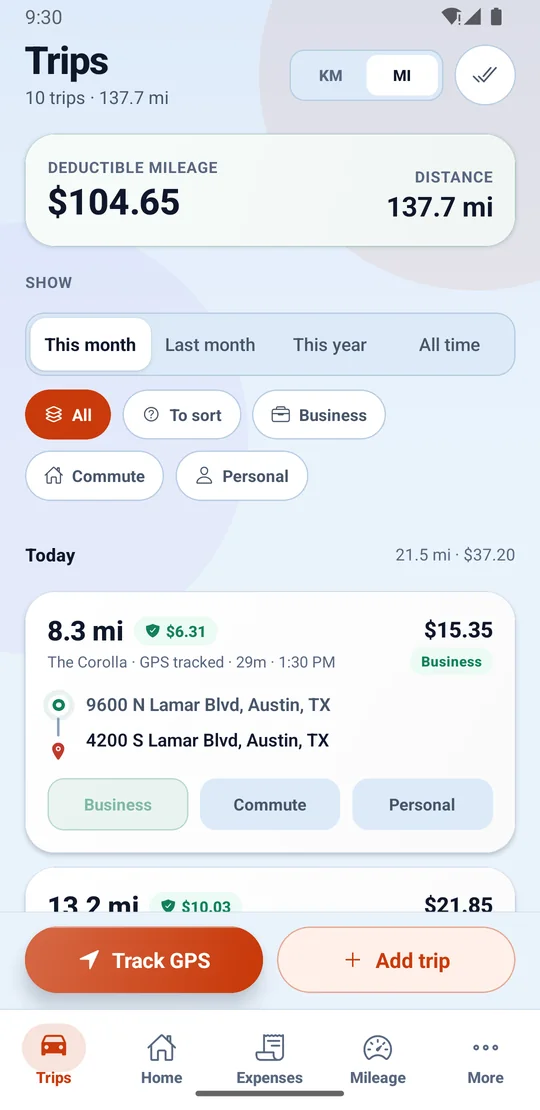 The Trips screen for a month, with deductible mileage and total distance at the top, filters for business, commute and personal, and a GPS-tracked trip showing its distance, deductible value, vehicle, start and end addresses and one-tap Business, Commute or Personal buttons.